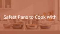 A collection of safe cooking pans on a kitchen counter, ceramic and stainless steel materials, clean and modern, bright natural lighting, realistic.